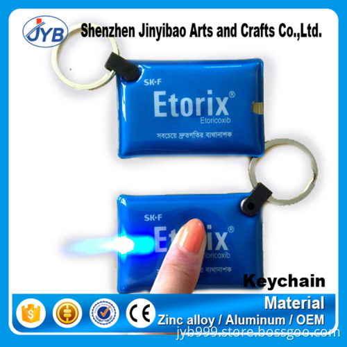 custom pvc leather cheap LED light keyring
